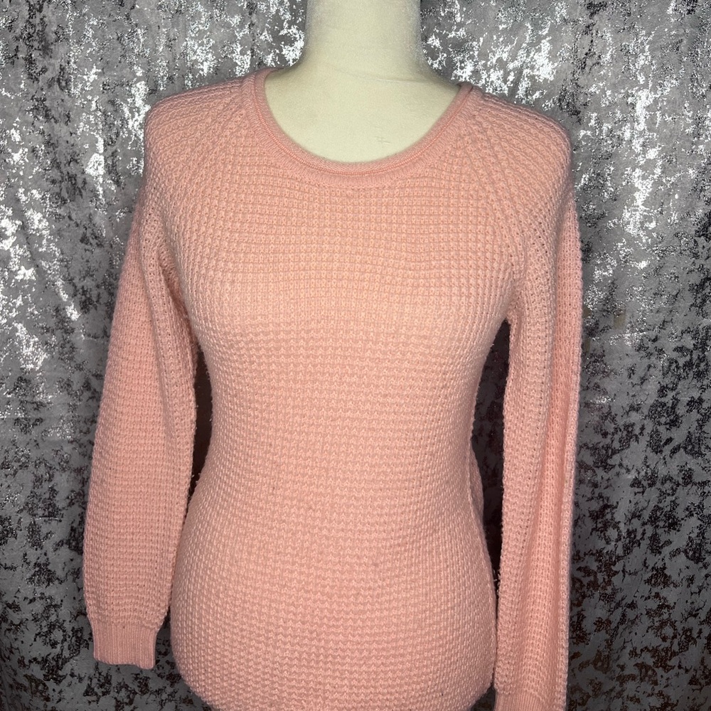 Pink knitted sweater